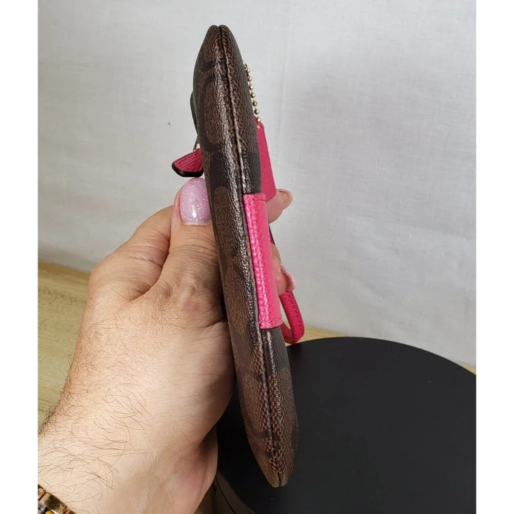 COACH Corner Zip Wristlet In Dark Brown Signature Leather w/ Hot Pink Stripe